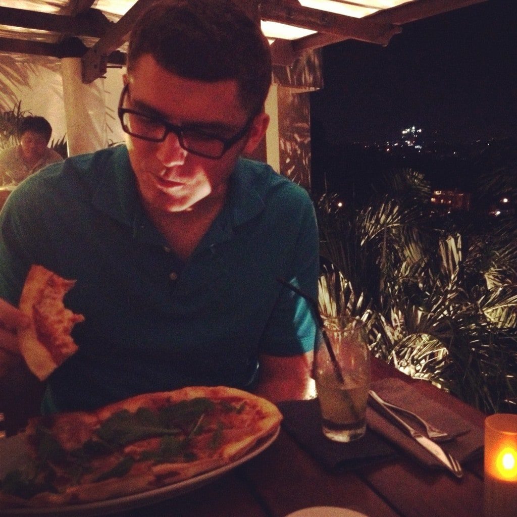 Man eating pizza.