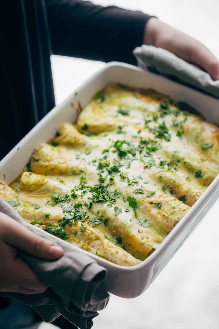 Breakfast enchiladas in a pan.