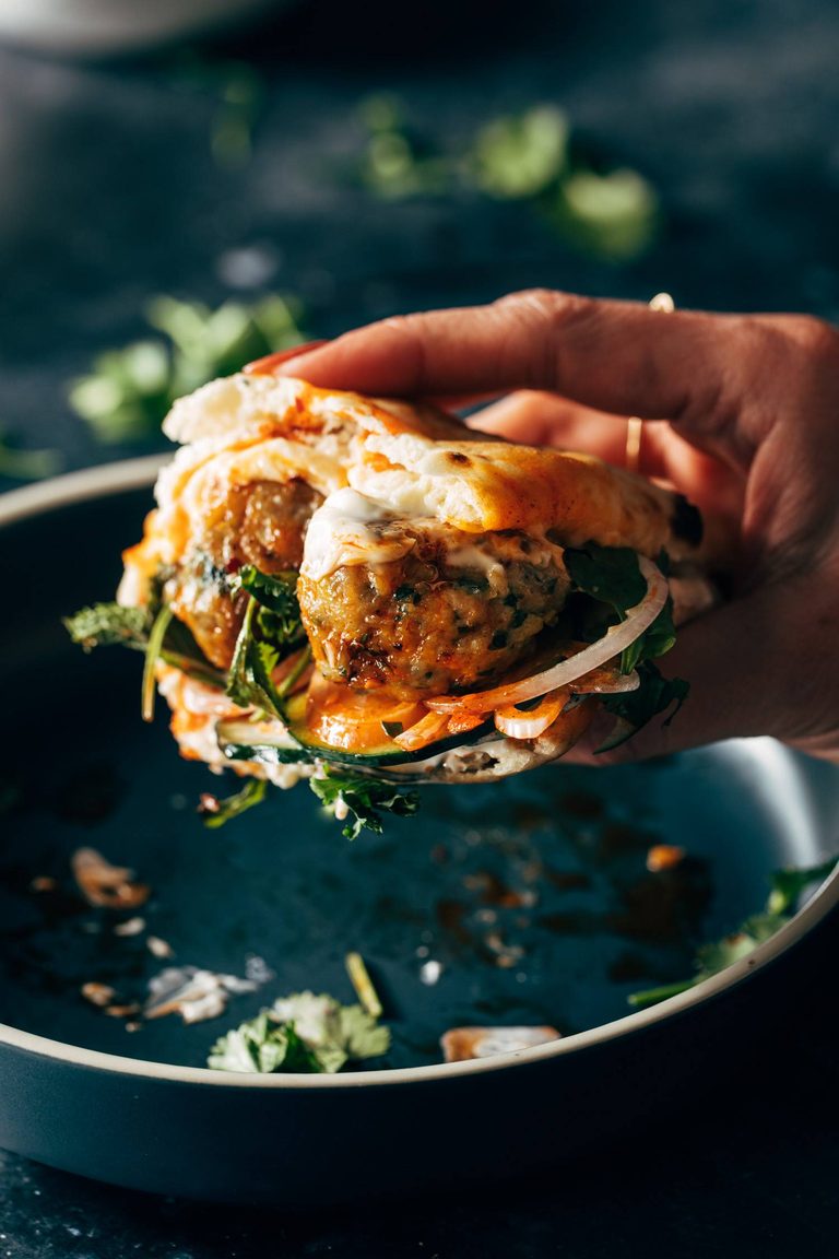 Meatball sandwich with pickled vegetables.