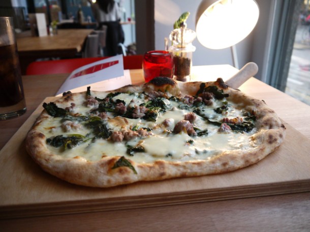 wild broccoli, pork and fennel sausage, chillies, cream and mozzarella pizza at Meter wild broccoli, pork and fennel sausage, chillies, cream and mozzarella pizza at meter