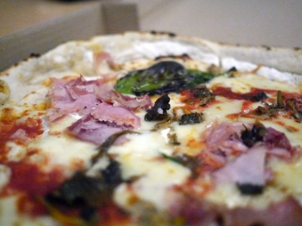 close up of gloucester old spot ham, mozzarella, ricotta and mushrooms pizza from franco manca