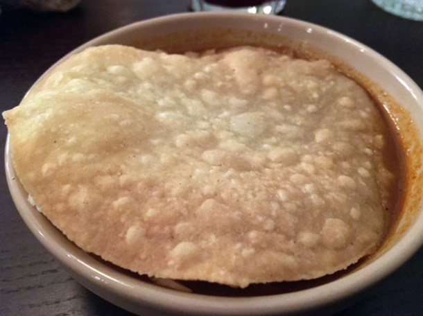 pork shoulder stew topped with tortilla at corazon