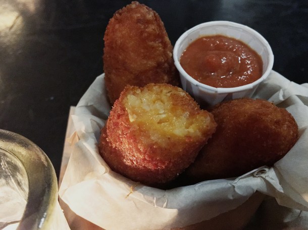 illustrative photo of the mozzarella and tomato arancini from Sugo at Vinegar Yard