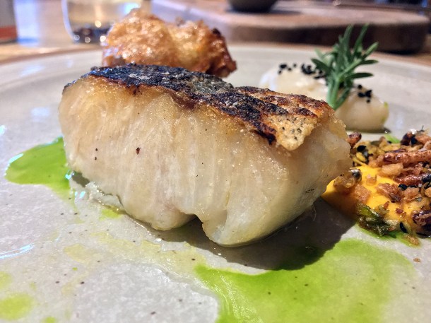 illustrative photo of the hake with cauliflower fritter and curry mayo at the Felin Fach Griffin