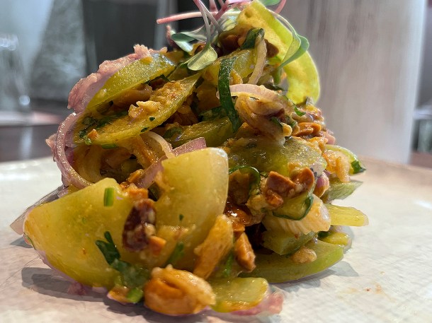 illustrative photo of the green tomato salad at Lahpet Covent Garden